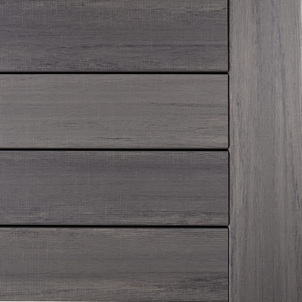 Close-up of gray TimberTech composite gate with horizontal slats and vertical post, showing realistic wood grain texture and clean seams.