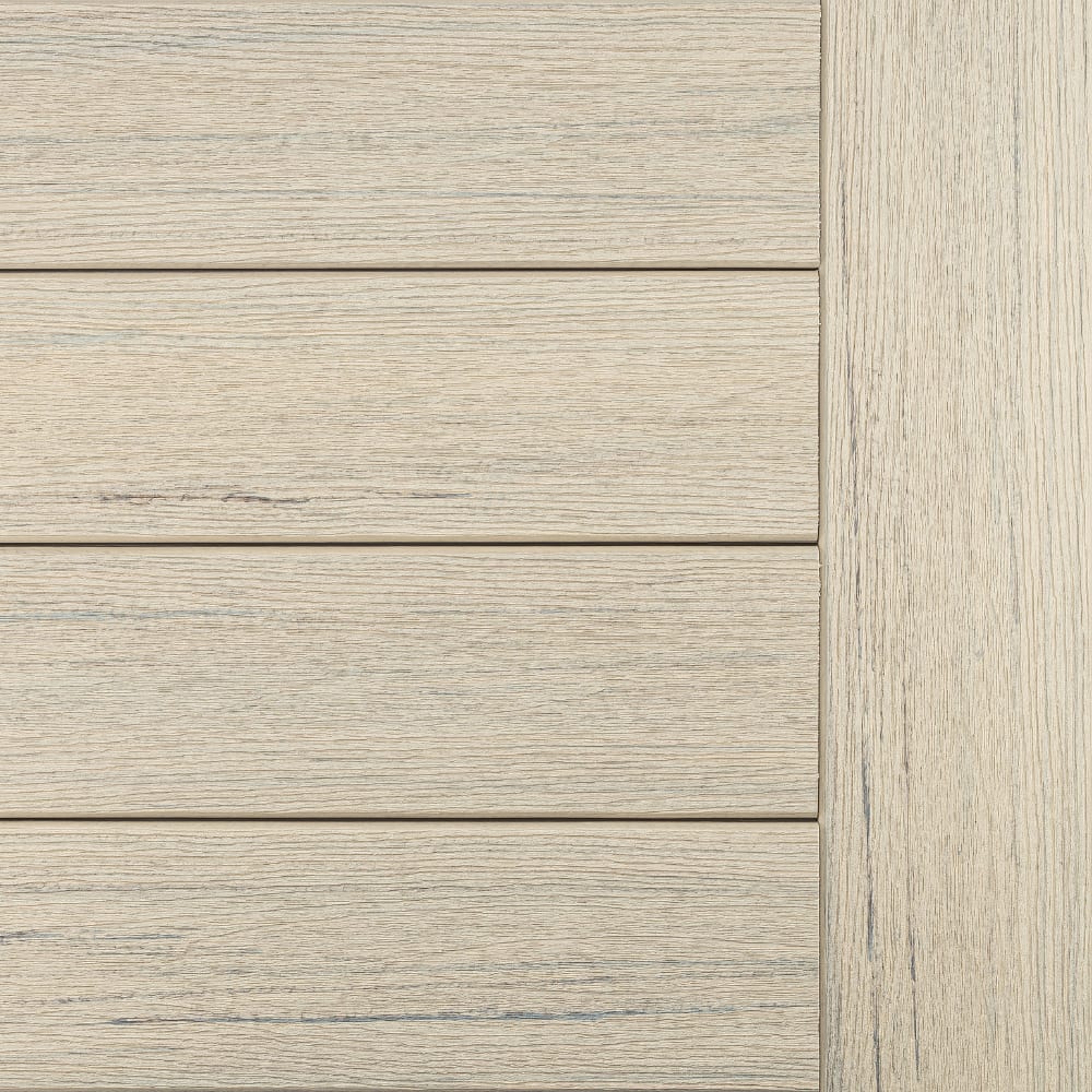 Reserve Reclaimed Chestnut composite siding with horizontal planks and vertical trim in light natural wood grain.