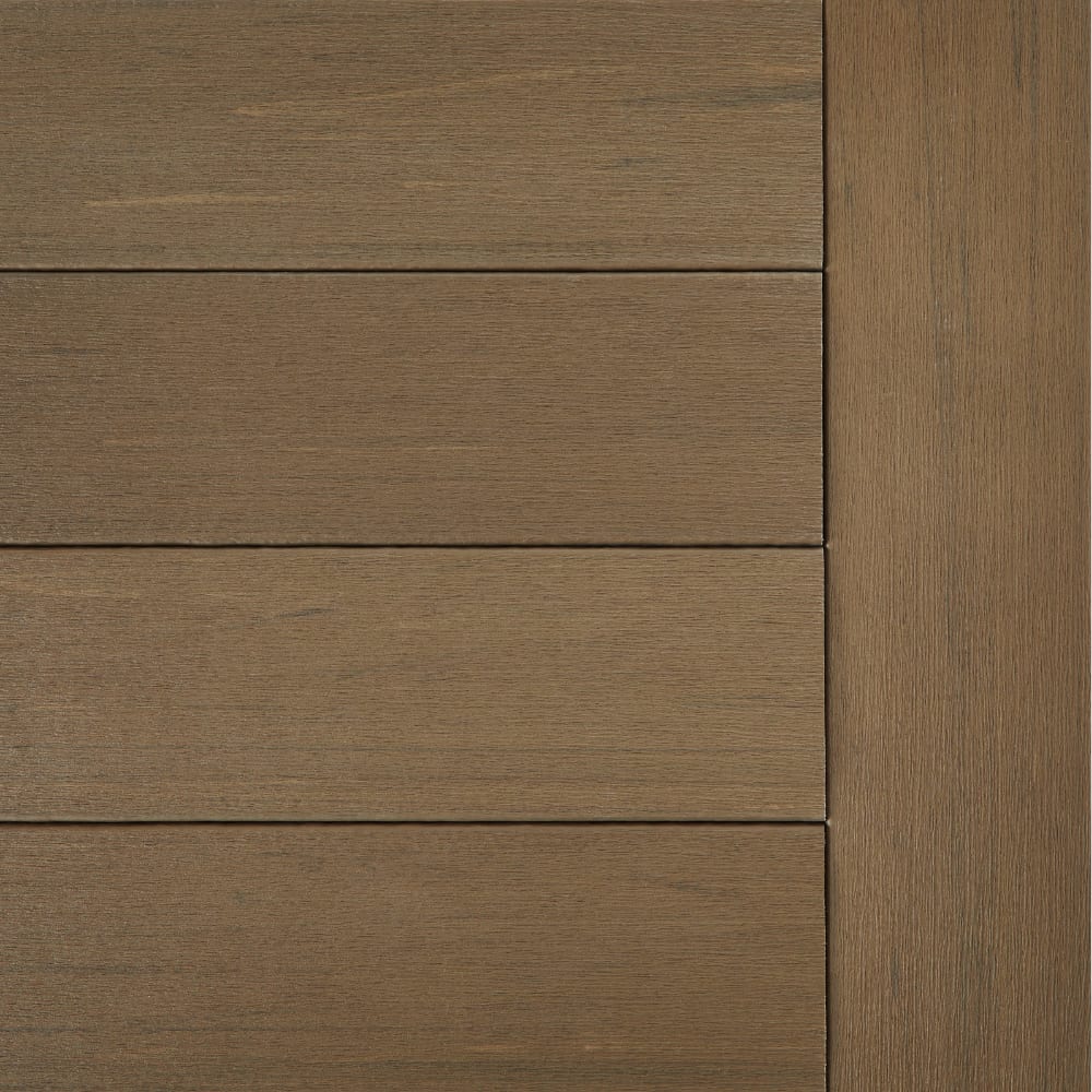 Dark oak composite decking planks with a vertical post edge.