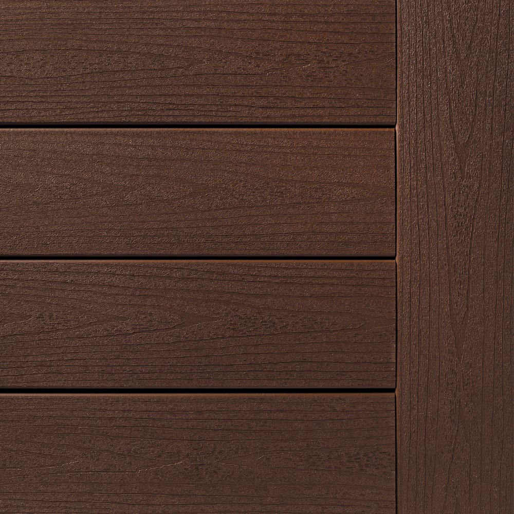 Close-up of brown composite decking with rustic elm grain texture, featuring horizontal planks and vertical edge panel.