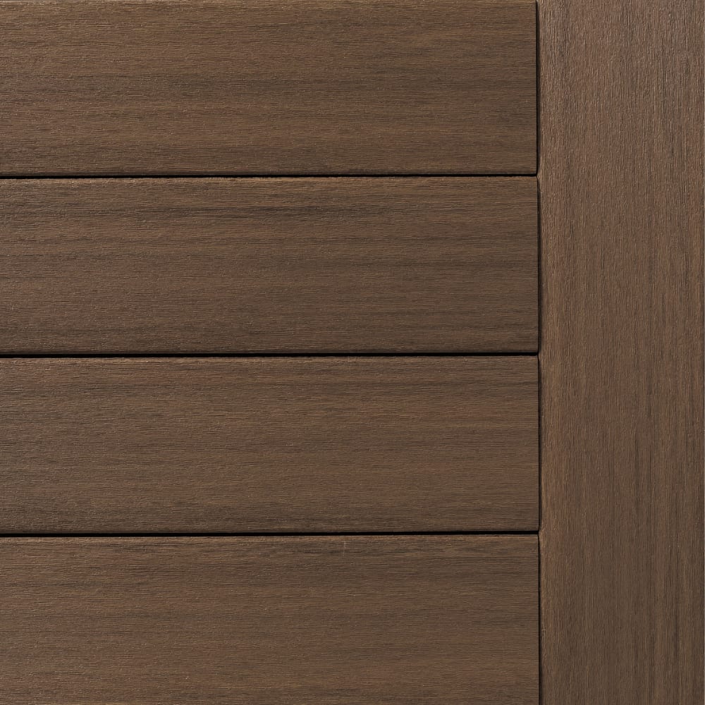Close-up of Vintage English Walnut APVC siding with horizontal planks and vertical trim.