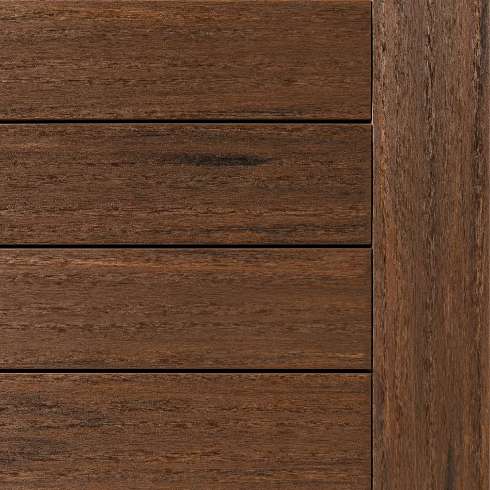 Close-up of Vintage Mahogany APVC decking showing horizontal planks with a vertical edge on the right, highlighting the wood grain texture.